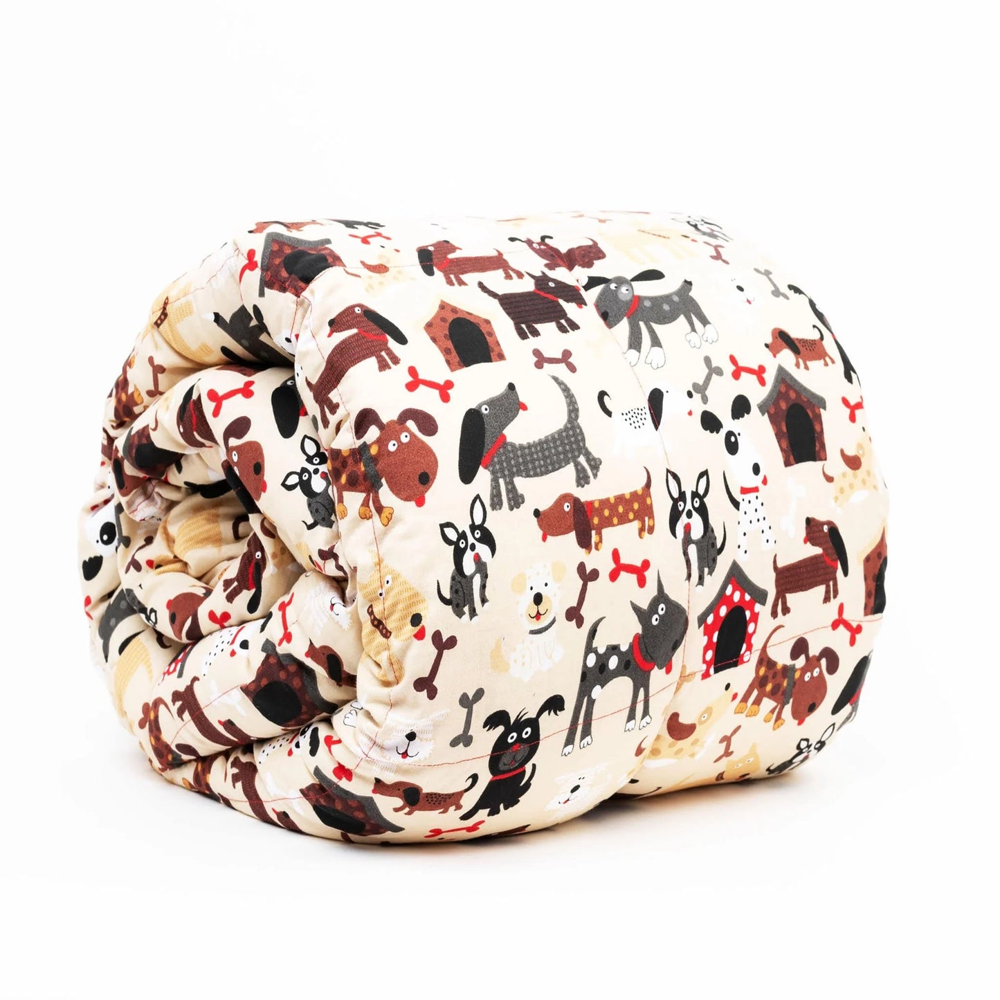A kids' weighted blanket with a colorful dog print design, rolled up and displayed on a white background.