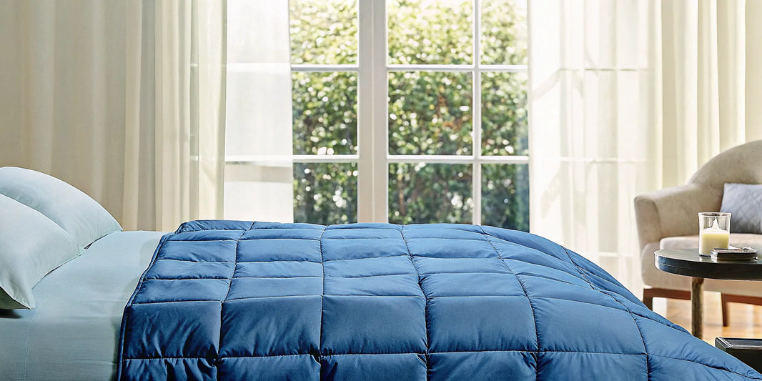 Weighted blanket on a bed.