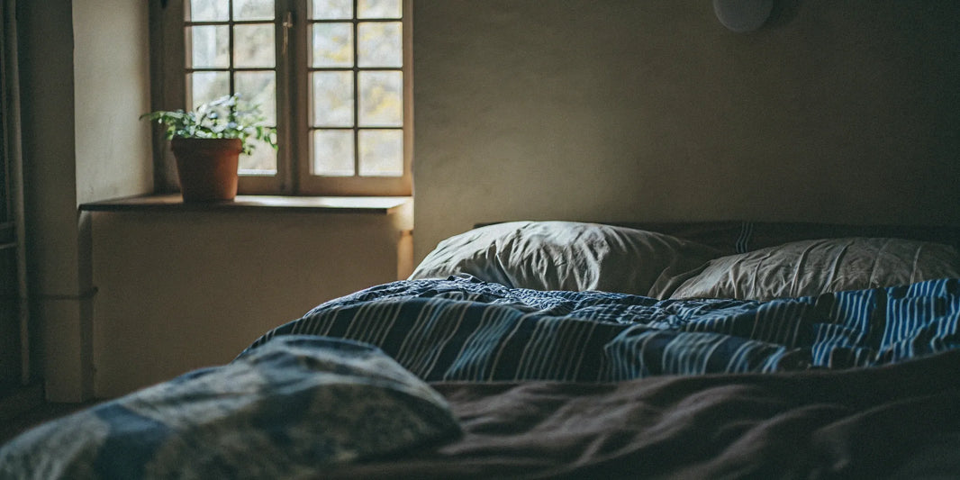 King-size weighted blanket on bed.