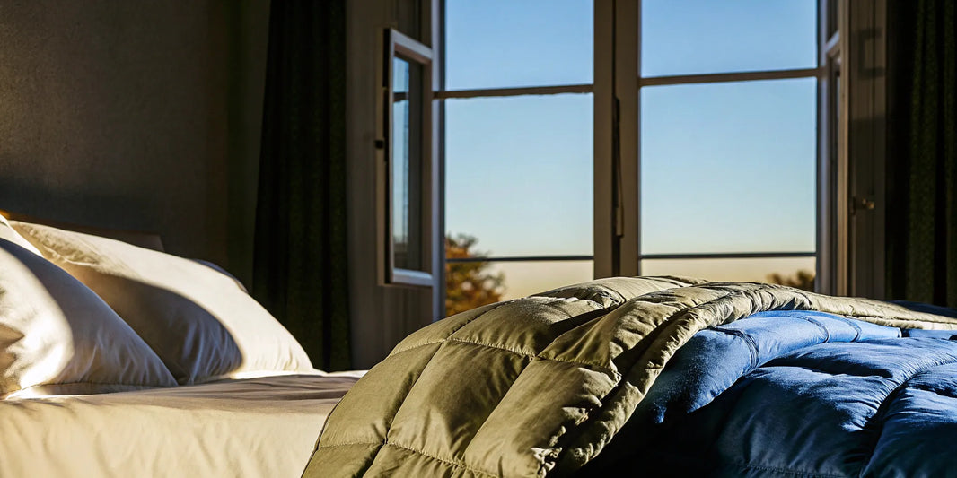 A weighted blanket on a bed, providing the calming benefits of deep pressure stimulation.