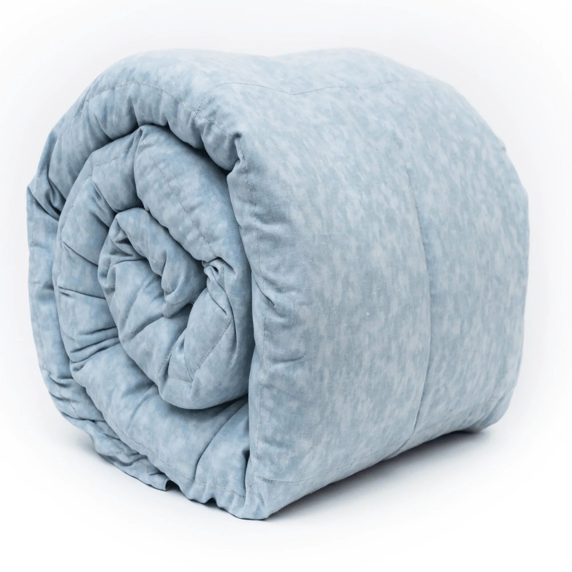 A rolled up weighted blanket in a light grey color, showing a textured pattern.