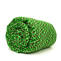 A kids' weighted blanket with a colorful green pixelated pattern, rolled up and displayed on a white background.