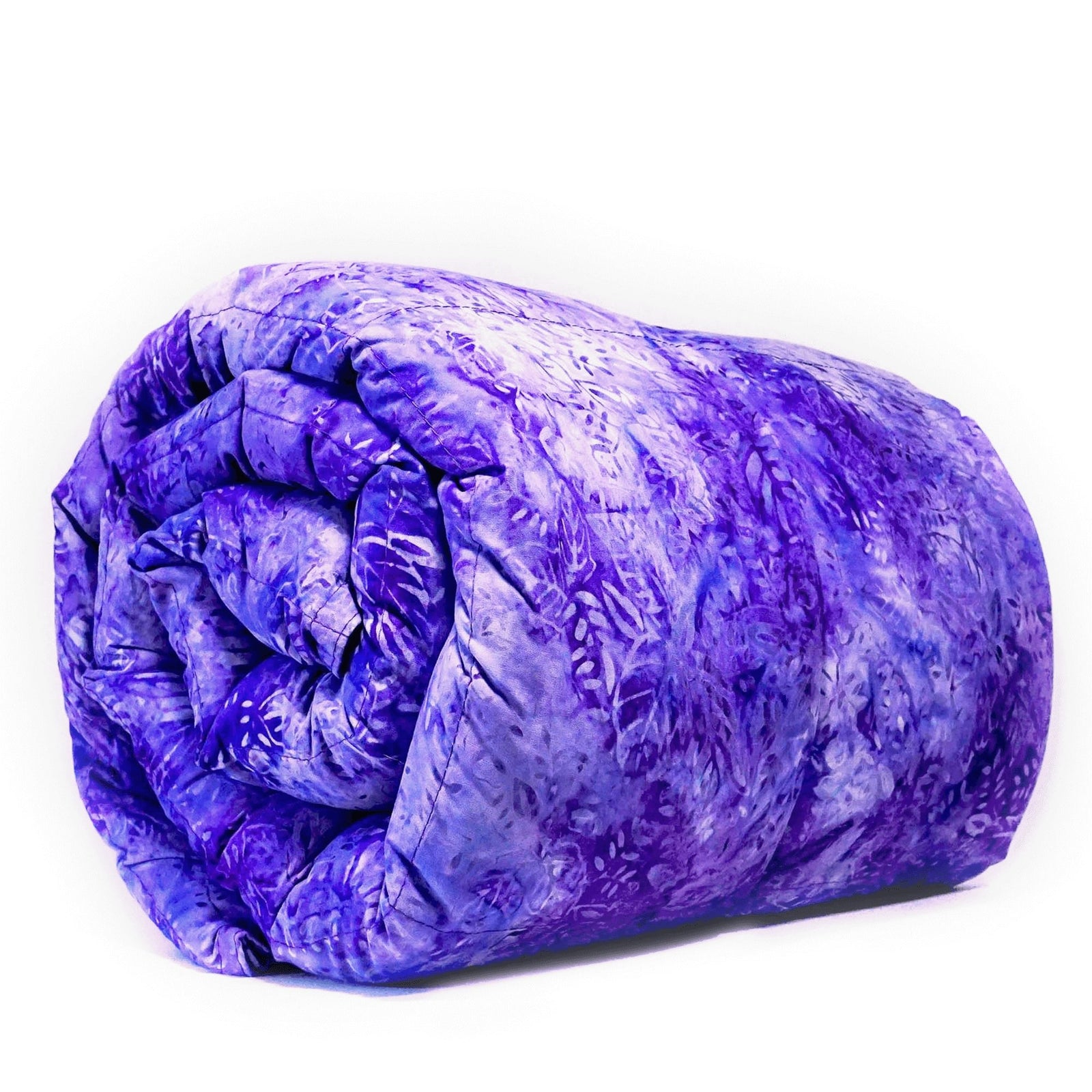 Woman in bed sipping from a mug under her Mosaic Weighted Blankets Purple in Bloom Weighted Blanket