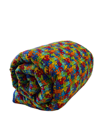Puzzle Pieces Weighted Blanket Rolled Side View
