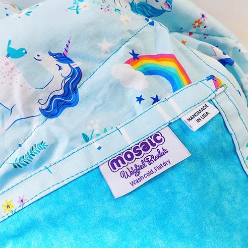 Mosaic Weighted Blankets Unicorn Weighted Blanket close up with made in america tags