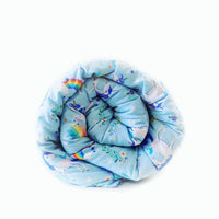 Unicorn Weighted Blanket Rolled Front View on Blue field