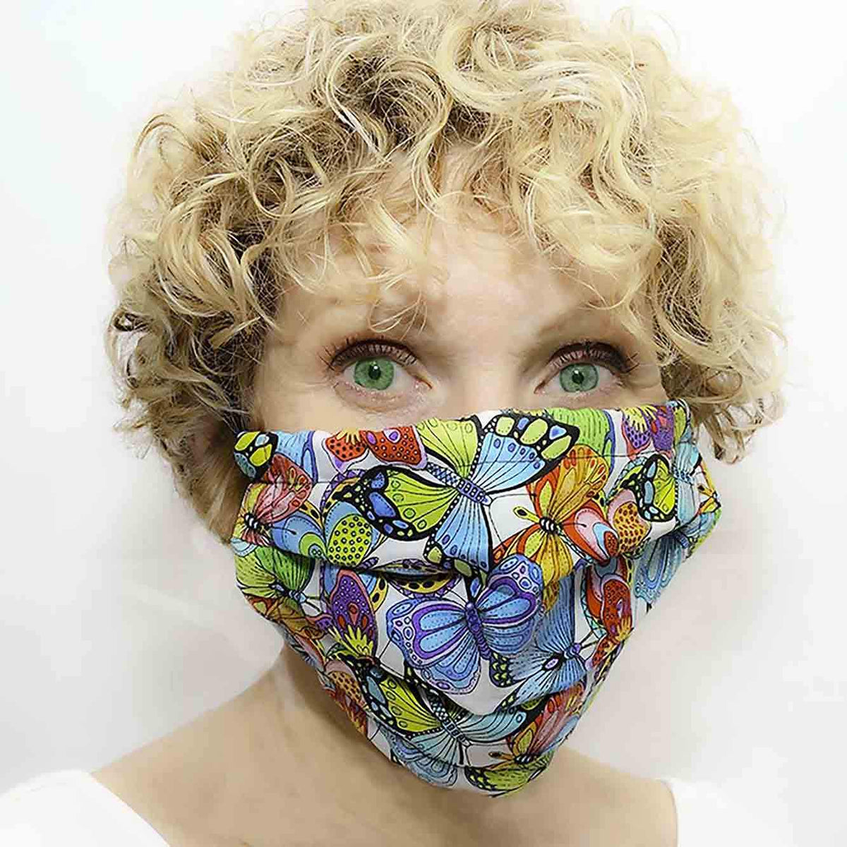Woman wears the Butterflies Mosaic Weighted Blankets Washable Mask